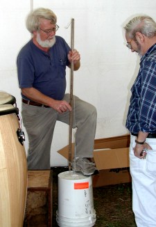 Dan demonstrates the string bass to Bill